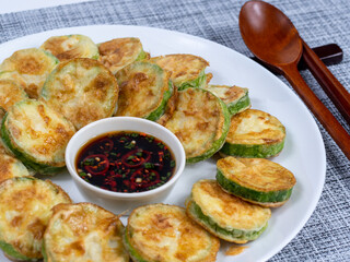 Korean food : Hobakjeon. Zucchini sliced, flour-coated, and pan-fried in egg batter.
