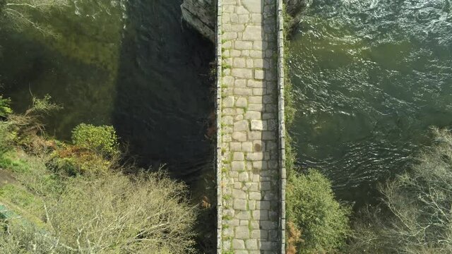 Bridge and river in Galicia,Spain. Aerial Drone Video. Camino de Santiago