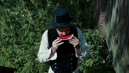 old timey eating watermellon