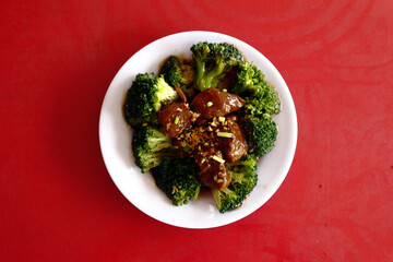 Freshly cooked beef with broccoli on a plate