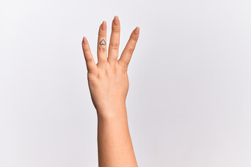Fototapeta premium Hand of caucasian young woman counting number 4 showing four fingers