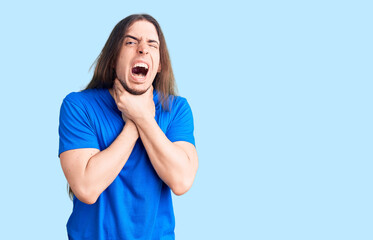 Young adult man with long hair wearing swimwear shouting and suffocate because painful strangle. health problem. asphyxiate and suicide concept.