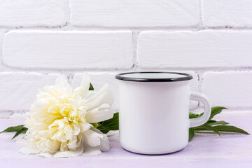 White campfire enamel mug mockup with cream peony