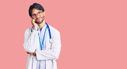 Handsome hispanic man wearing doctor uniform and stethoscope thinking looking tired and bored with...