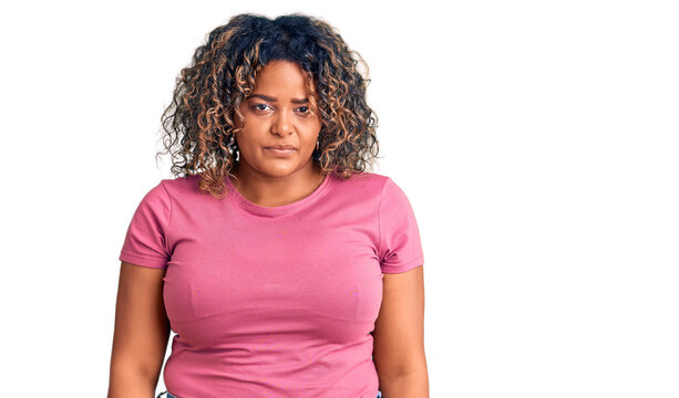 Young african american plus size woman wearing casual clothes depressed and worry for distress, crying angry and afraid. sad expression.