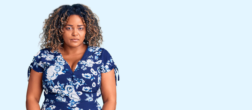 Young african american plus size woman wearing casual clothes depressed and worry for distress, crying angry and afraid. sad expression.