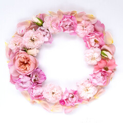 Round  composition, made of pink roses on white background. Flat lay, top view, copy space, square