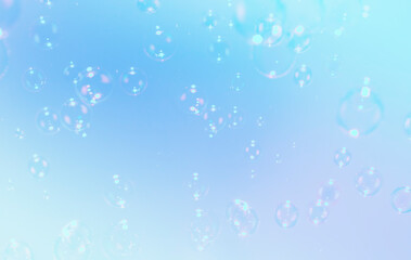 Beautiful gradient colors blue background with soap bubbles float in the air.