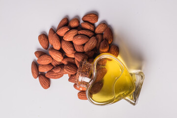 Almond oil on a wooden background