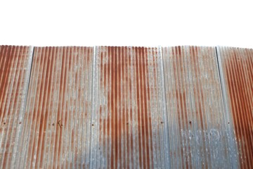 Old brown rusty zinc sheet on white sky for background backdrop 
