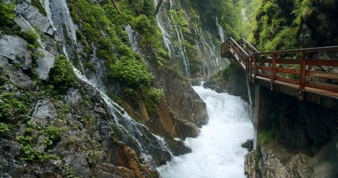 Wimbachklamm gorge in Southern Bavaria, Germany. Many small waterfalls running into alpine brook river