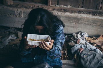 poor people,homeless or beggar begging for help sitting at dirty slum.concept for poverty...