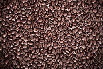 Roasted coffee beans background. Natural texture.
