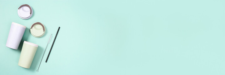 Reusable eco friendly bamboo cup for take away coffee and metal drinking straw.