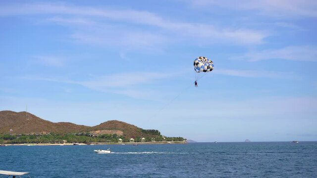 parasailing over the sea. Summer vacation concept