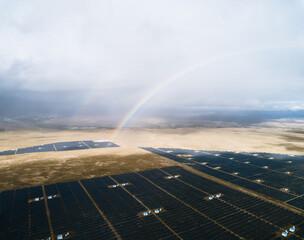 rainbow and photovoltaic panels of solar power station