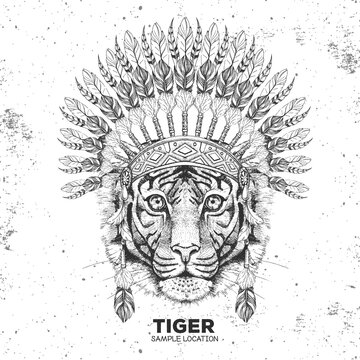 Hipster animal tiger with indian feather headdress. Hand drawing Muzzle of animal tiger