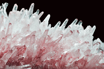 red and white small crystals on black