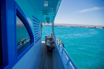 Fototapeta na wymiar deck of yacht on azure sea water