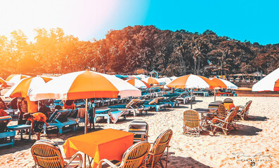 beach chairs and umbrella on the beach