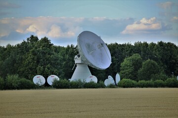 satellite dish on a field
