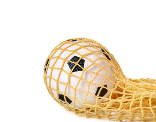 Soccer ball in net on white background