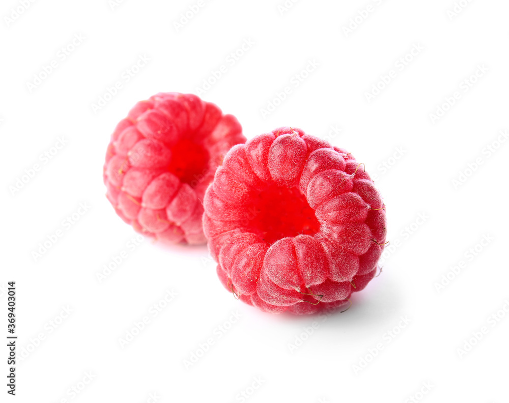 Wall mural tasty ripe raspberries on white background