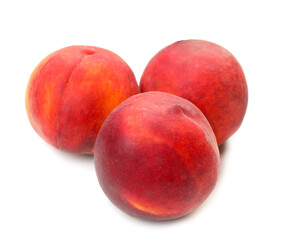 Sweet ripe peaches on white background