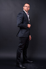 Portrait of handsome bearded businessman with eyeglasses