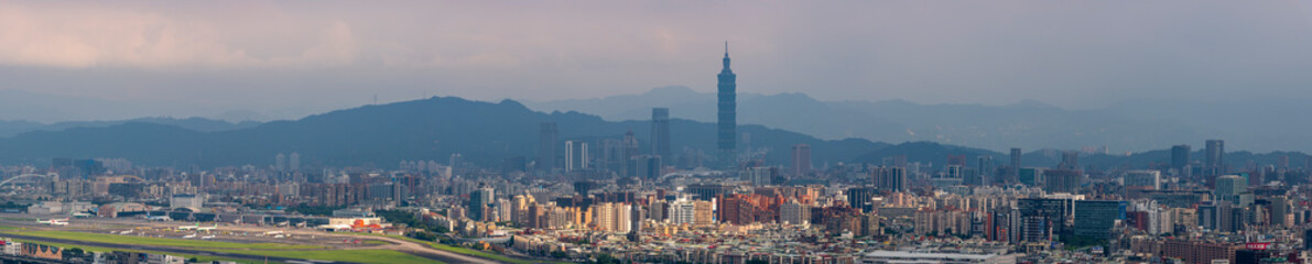 Fototapeta na wymiar Taipei Sonshan Airport & Taipei 101 Building, Taiwan