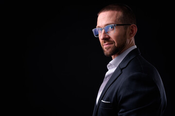 Portrait of handsome bearded businessman with eyeglasses