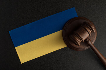 Judge Gavel and flag of Ukraine. Law and justice in Ukraine. Violation of rights and freedoms