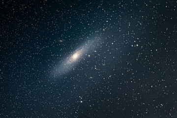 Obraz na płótnie Canvas space background with stars of the andromeda galaxy