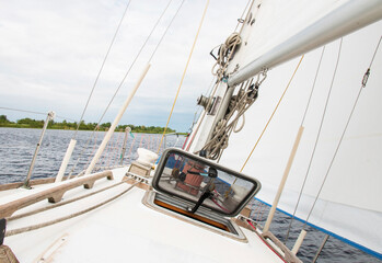 Sailing boat breaking waves in the  sea, Europe