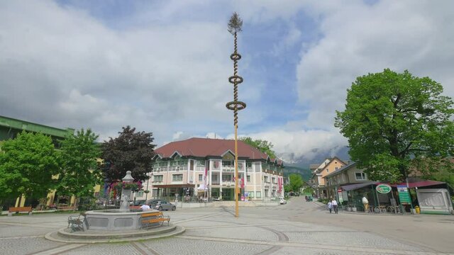 Traditional Maypole in the middle of Bad Goisern town square, Austria. Steadicam shot