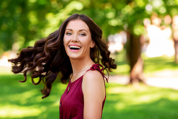 leisure and people concept - happy smiling woman at summer park