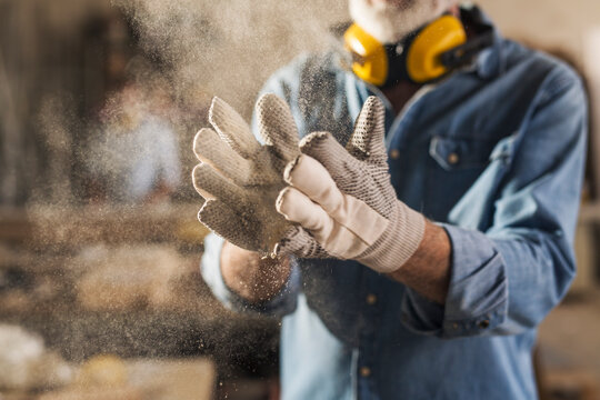 Close up of dusty work gloves