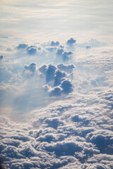 Sky and clouds from above the ground viewed from an airplane