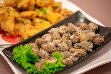 Taiwan’s authentic national delicacy, salt-baked pepper snails