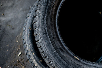 Old tires stacked, Close-up Broken tire damaged, A bunch of old tires from used cars.