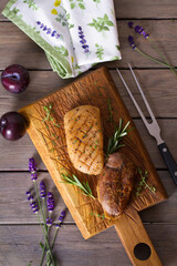 Duck breast fillets with herbs. View from above, top studio shot