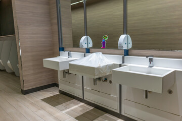 Samut Prakan Province, Thailand on July 18, 2020: Measures to prevent the spread of the coronavirus (civid-19), social distancing in a toilet of a department store.