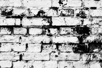 Texture of a brick wall with cracks and scratches which can be used as a background
