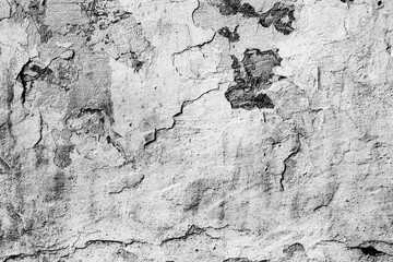Texture of a concrete wall with cracks and scratches which can be used as a background