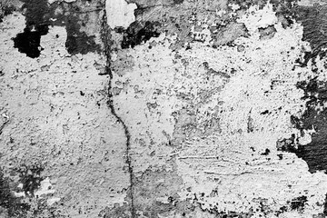Texture of a concrete wall with cracks and scratches which can be used as a background