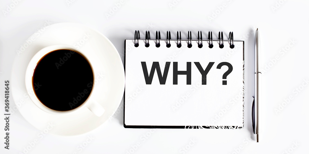 Aufkleber text why , planning concept. notebook with text on white background with coffee