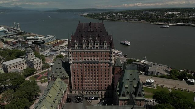 Fairmont Le Chateau Frontenac - Chateau Frontenac Overlooking The St. Lawrence River And Old Quebec's Lower Town At Daytime In Quebec, Canada. - aerial drone