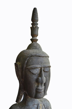 Ancient black craven wooden Buddha image on white background