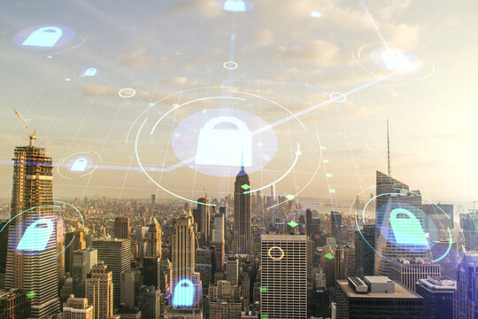 Double exposure of virtual creative lock hologram with chip on New York city skyscrapers background. Information security concept
