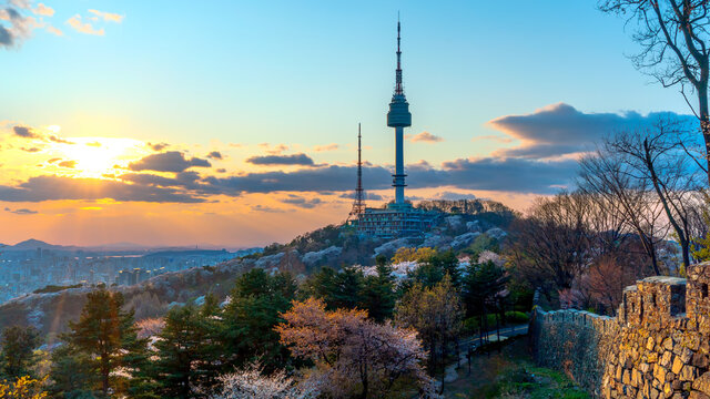 View of sunset in seoul city with seoul tower at namsan public park